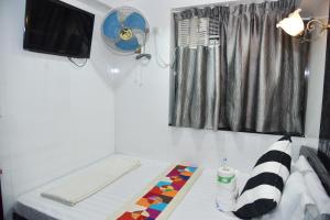 Giường trong phòng chung tại David Lounge