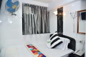 Giường trong phòng chung tại David Lounge