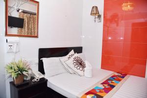 Giường trong phòng chung tại David Lounge