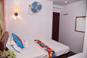 Giường trong phòng chung tại David Lounge