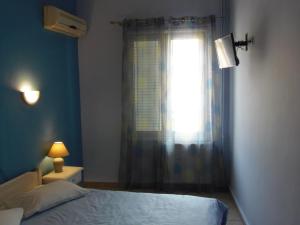 Postel nebo postele na pokoji v ubytování Hera Hotel