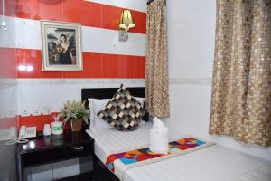 Giường trong phòng chung tại David Lounge