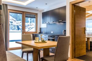 Kuchyňa alebo kuchynka v ubytovaní Hotel Garni Persutt