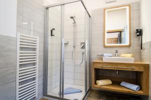 Kúpeľňa v ubytovaní Hotel Garni Persutt