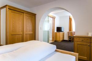 Posteľ alebo postele v izbe v ubytovaní Hotel Garni Persutt