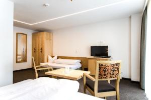 Posteľ alebo postele v izbe v ubytovaní Hotel Garni Persutt