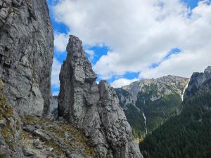 a rock formation on the side of a mountain at Przystanek Dolina Kościeliska in Kościelisko +6 photos