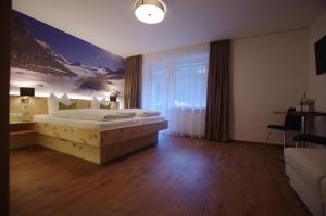 Postel nebo postele na pokoji v ubytování Hotel Zerres
