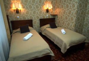 Posteľ alebo postele v izbe v ubytovaní Hotel Plock