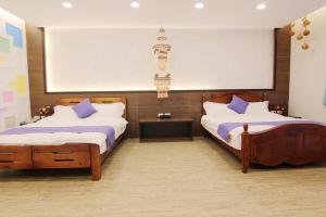 Letto o letti in una camera di Zi Jìng Fang Inn