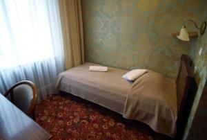 Posteľ alebo postele v izbe v ubytovaní Hotel Plock