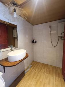 a bathroom with a sink and a shower at Motho Homestay โมโทโฮมสเตย์ in Chom Thong +102 photos