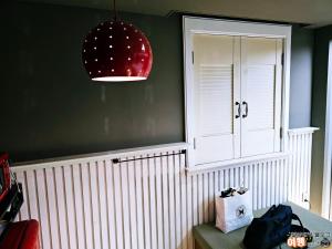 a room with a white cabinet and aendant light at 김천747모텔 in Pusang