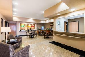 a hotel lobby with a bar and a restaurant at Quality Inn Killeen Near Fort Hood in Killeen
