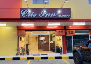 a bus firm restaurant with a sign on the front of it at Cris Inn - Bayugan in Bayugan City
