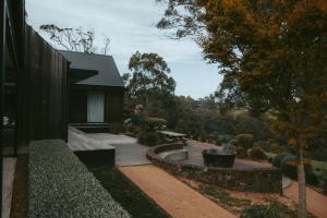 a house with a view of a garden at Injala House - Designer Masterpiece, Exeter in Exeter
