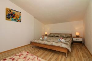 Posteľ alebo postele v izbe v ubytovaní Apartment Antonio