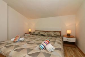 Posteľ alebo postele v izbe v ubytovaní Apartment Antonio