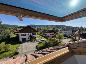 a view from the balcony of a house at L'ANTRE Deux LACS avec parking et garage in Xonrupt-Longemer