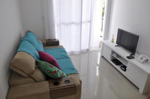 Una televisión o centro de entretenimiento en Apartamento no Campeche