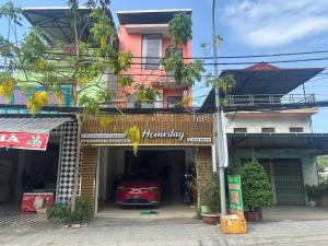 a car is parked inside of a garage at Pá Homestay - Thành phố Cao Bằng in Cao Bằng +28 photos