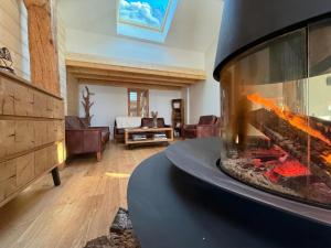 Gallery image of Chalet paisible en pleine nature - Sauna & jeux in Champ-Laurent