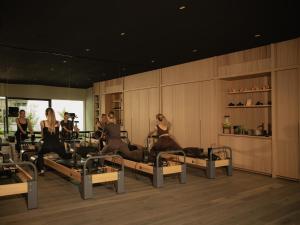 a group of people in a salon getting their hair done at Eisenhut Boutique Hotel in Bolzano
