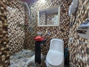 a bathroom with a sink and a toilet at 인터시티365호텔 in Seoul +23 photos
