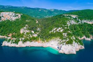 an aerial view of an island in the water at Villa Pia by Briskva in Brseč