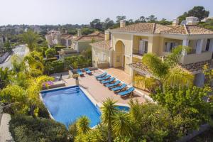 an aerial view of a villa with a swimming pool at Villa Valentina by Algarve Holidays in Almancil