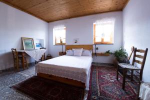 Posteľ alebo postele v izbe v ubytovaní Nightingale Cottage Pelion