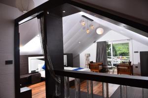 a view of a room with a bedroom and a living room at GOLDEN GREEN RESORT WITH Pool in Munnar