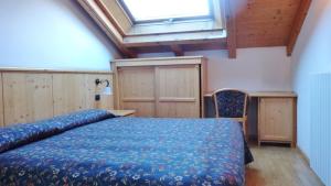 Postel nebo postele na pokoji v ubytování Hotel Giardino