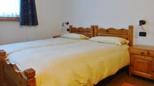 Postel nebo postele na pokoji v ubytování Hotel Giardino