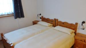 Postel nebo postele na pokoji v ubytování Hotel Giardino