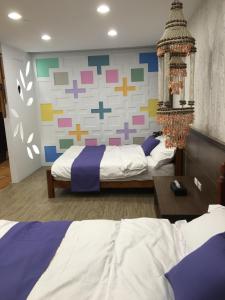 Letto o letti in una camera di Zi Jìng Fang Inn