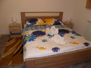 Postel nebo postele na pokoji v ubytování Apartman Marko