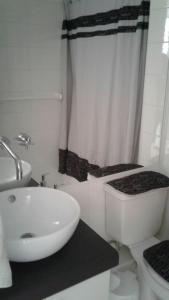 Ванная комната в Departamento Costa Mansa