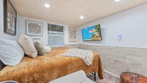 a bedroom with a large bed in a room at Swiftie Suite Beach Getaway Studio in Santa Rosa Beach