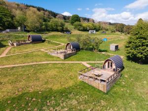 an overhead view of a field with several huts at Reservoir View Micro Cabin in Dol-y-gaer Station
