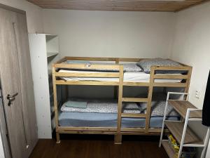 a room with two bunk beds in a room at Chatička u Perniců in Jedovnice