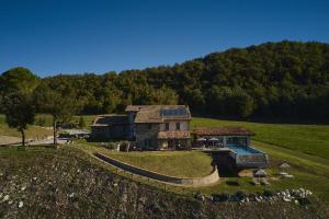 an aerial view of a house on a hill at Aura Relais in Urbino