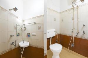 a bathroom with a toilet and a sink at Brill Rooms Near City Centre Metro Station in Salt Lake City