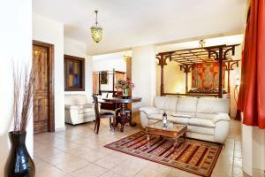 Posezení v ubytování Akritas Ef Zin Villas & Suites