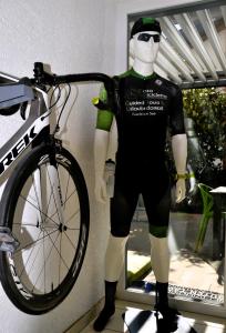 a man standing next to a bike on a shelf at Casa Bicicletta in Fuschl am See