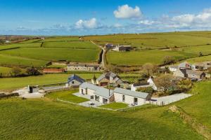 an aerial view of a house in a field at 3 Bed in Wendron oc-w29093 in Wendron