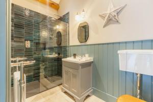 a bathroom with a shower and a sink at 3 Bed in Wendron oc-w29093 in Wendron +32 photos