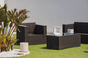 a group of furniture on the grass with plants at Ventidue Venti in Bari +287 photos