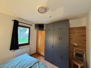 Llit o llits en una habitació de Der Highlander