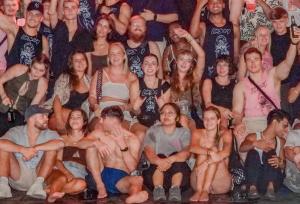 a large group of people posing for a picture at Lushy Hostel Kuta Legian in Legian